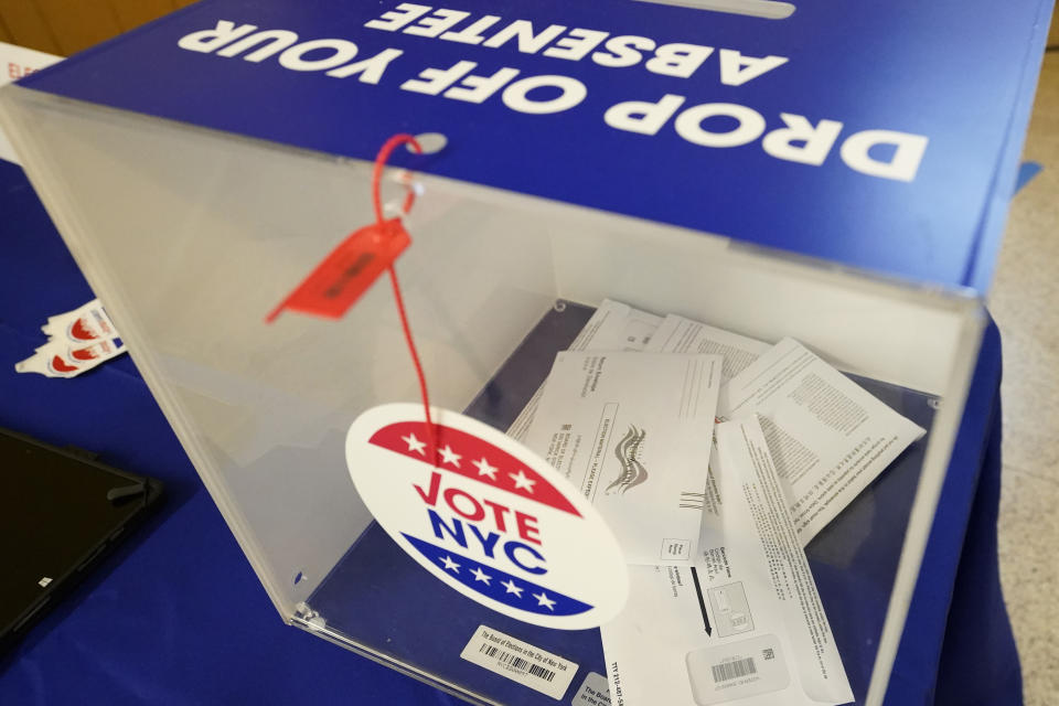 FILE - Absentee ballots sit inside a sealed ballot box during early voting in the primary election, June 14, 2023, in the SoHo neighborhood of New York. New York’s highest court will hear arguments Wednesday, Nov. 15, in a lawsuit that could reshape congressional districts in the state, which is expected to be a key battleground in 2024 in the fight for control of the U.S. House. (AP Photo/Mary Altaffer, File)