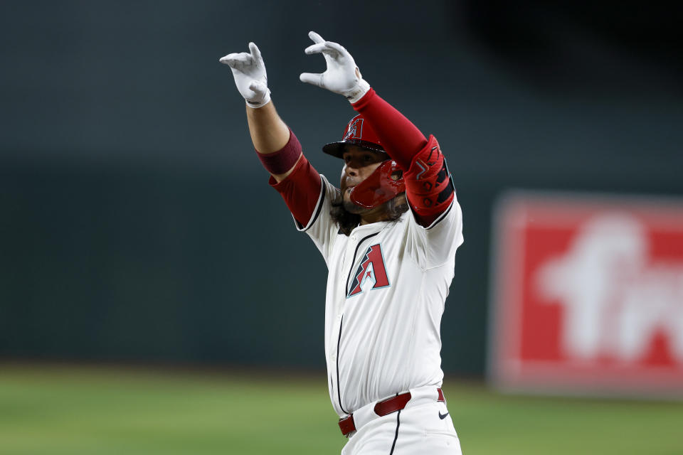 PHOENIX, AZ - MARCH 28: Eugenio Suarez #28 of the Arizona Diamondbacks reacts after hitting a single in the second inning of the game between the Colorado Rockies and the Arizona Diamondbacks at Chase Field on Thursday, March 28, 2024 in Phoenix, Arizona. (Photo by Chris Coduto/MLB Photos via Getty Images)