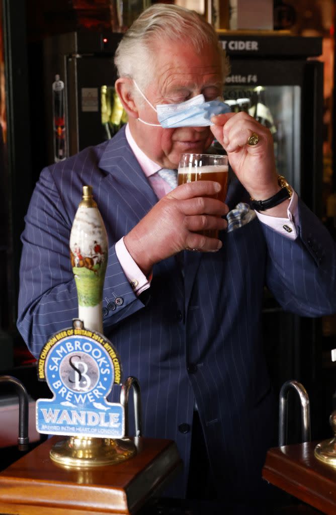 After pouring a pint during a royal visit in 2021, people noticed how swollen Charles' fingers looked. (Getty Images)