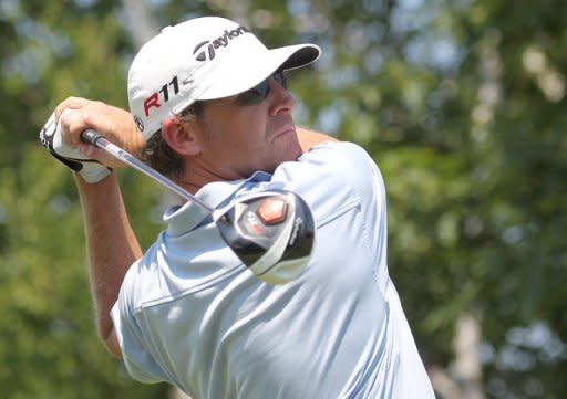 David Mathis watches his shot from the 10th tee box during Round One of the 2012 Travelers Championship at TPC River Highlands, on June 21, in Cromwell, Connecticut. Mathis fired his first hole-in-one at a US PGA event on the way to a six-under par 64 and a one-stroke lead