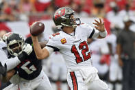 Tampa Bay Buccaneers quarterback Tom Brady (12) fires a pass against the Atlanta Falcons during the first half of an NFL football game Sunday, Sept. 19, 2021, in Tampa, Fla. (AP Photo/Jason Behnken)