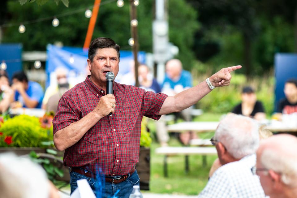 Democrat Joel Miller, candidate for Iowa secretary of state, speaks during the inaugural County Line fundraiser, Saturday, Sept. 3, 2022, at Sutliff Farm & Cider House in Lisbon, Iowa.