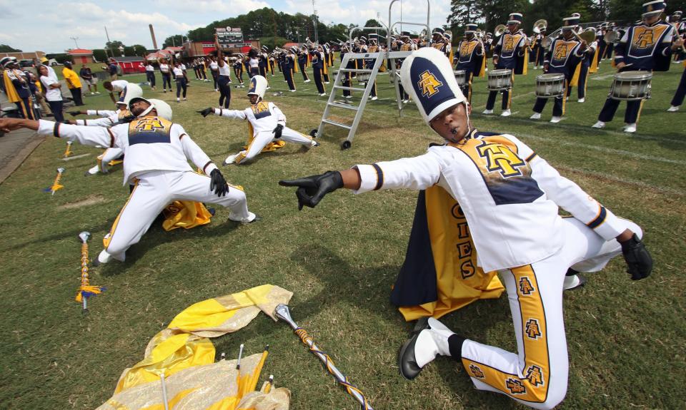 South Point graduate Garvin Collins, right, rehearses with the North Carolina A & T marching band in Lineberger Stadium at South Point High School in Belmont Saturday afternoon, September 3, 2022.