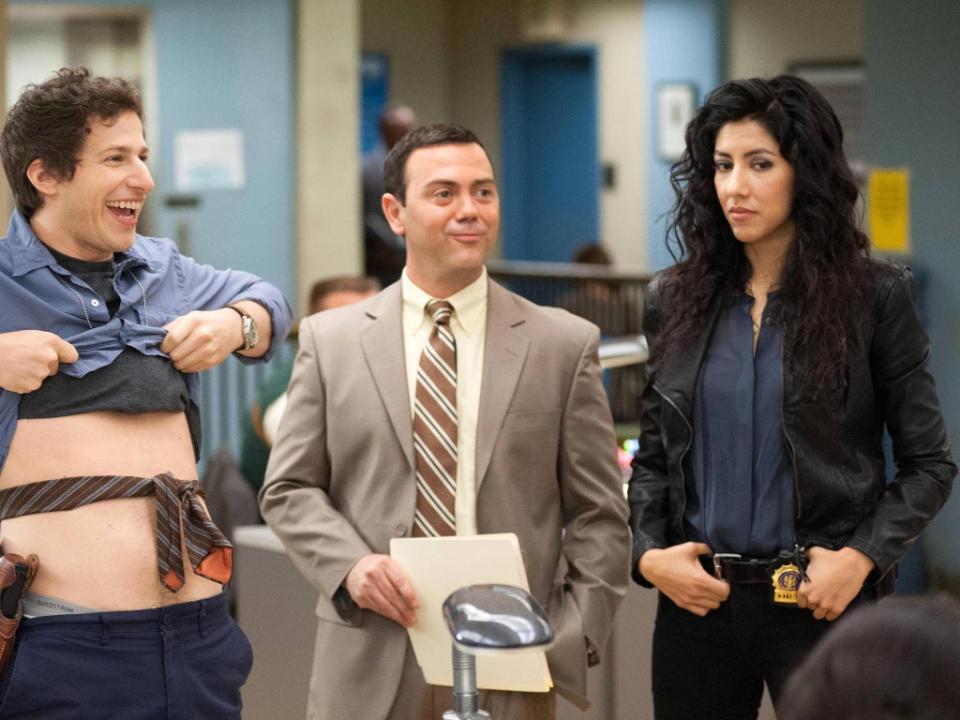 Beatriz with Andy Samberg and Joe Lo Truglio in ‘Brooklyn Nine-Nine’ (Fremulon/Dr Goor Prods/Universal TV/Kobal/Shutterstock)