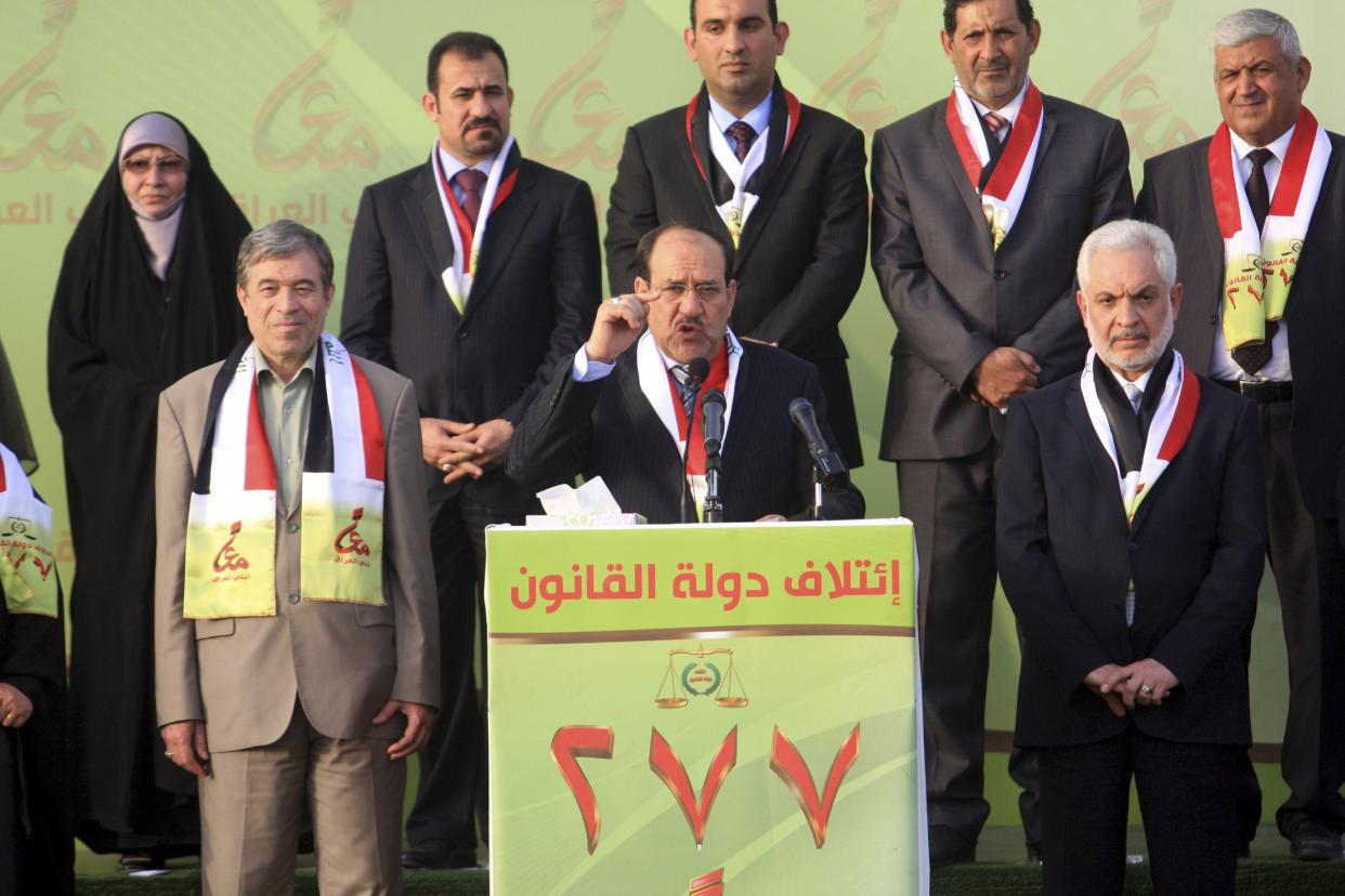 Iraq&#39;s Prime Minister Nuri al-Maliki speaks to his supporters during a ceremony in Kerbala.