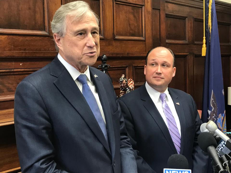 Outgoing New York GOP Chair Ed Cox, left, and incoming Chair Nick Langworthy speak to reporters at state Republican headquarters in Albany on May 21, 2019. Ed Cox took on the role again in 2023.