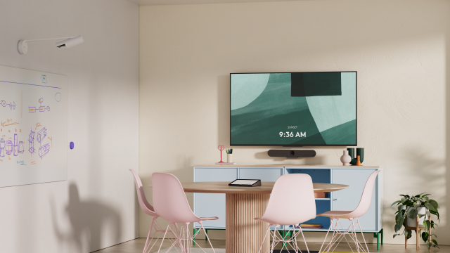  A room with a big display using Logitech's new all-in-one video bar. 