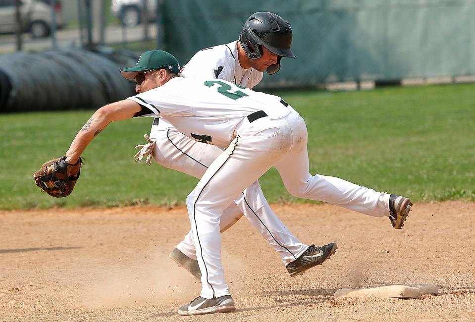 Kegal Black Knights' Blaine Millheim gets back to second base safely on a pickoff attempt as New York Gremlins second baseman Ladislo Malarczuk fields the throw from the catcher in the first inning in the championship game Sunday, July 18, 2021 at Brookside Park. TOM E. PUSKAR/TIMES-GAZETTE.COM