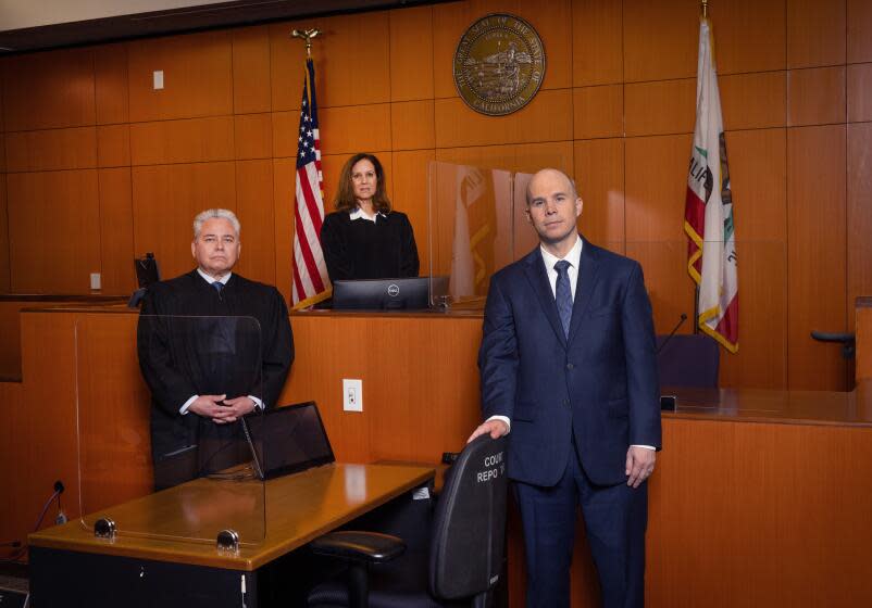 Santa Monica, CA - April 05: From left: Assistant Presiding Judge Sergio C. Tapia II, Presiding Judge Samantha P. Jessner, and Executive Officer/Clerk of Court David W. Slayton, Superior Court of Los Angeles County, are photographed at Santa Monica Courthouse in Santa Monica Friday, April 5, 2024. There is a dire lack of court reporters across the state, which is leading to hundreds of thousands of proceedings occurring without a verbatim record. These officials are among many sounding the alarm that this is a "constitutional crisis" causing unequal access to justice depending on a person's wealth to pay for a private reporter. (Allen J. Schaben / Los Angeles Times)