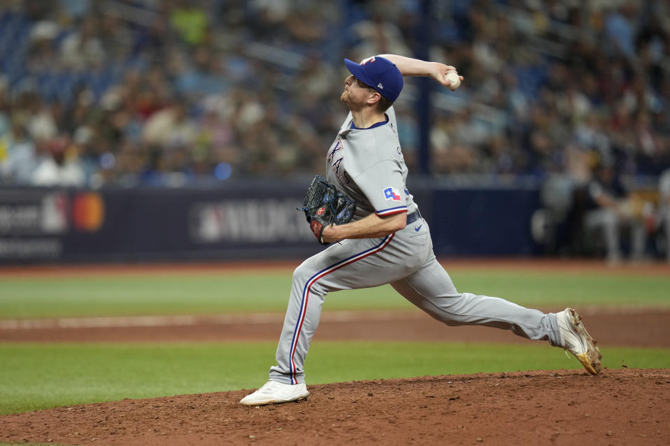 Texas Rangers' Josh Sborz delivers a pitch in the eighth inning during Game 2 in an AL wild-card baseball playoff series against the Tampa Bay Rays, Wednesday, Oct. 4, 2023, in St. Petersburg, Fla. (AP Photo/John Raoux)