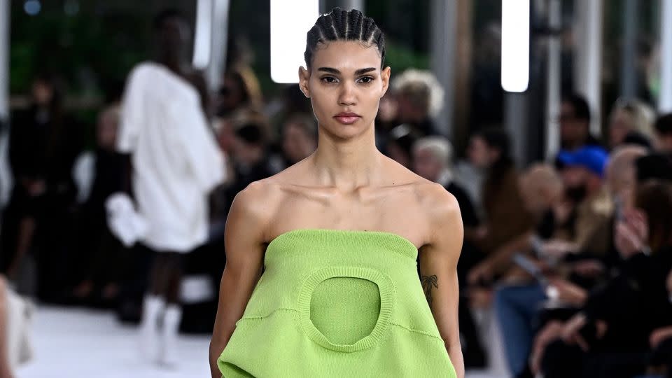 At Issey Miyake, sweaters were flipped and worn in alternative ways or even transformed into dresses. - Julien De Rosa/AFP/Getty Images