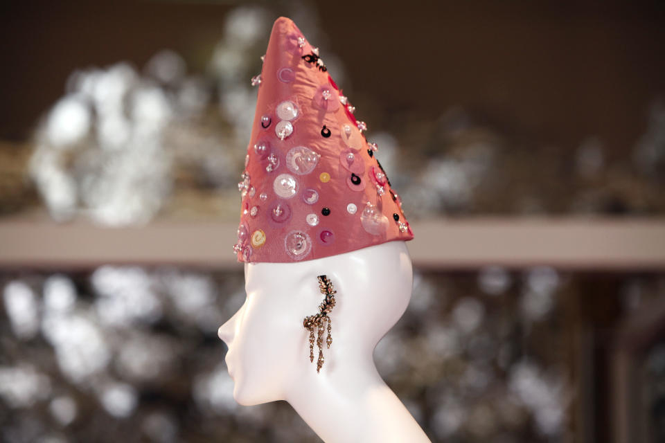 A mannequins presents a hat by French designer Christian Lacroix for Schiaparelli's fashion collection presented in Paris, Monday, July 1, 2013. (AP Photo/Thibault Camus)