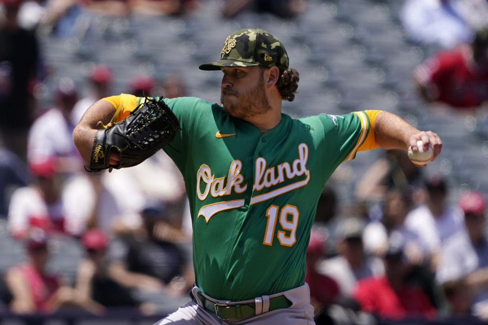 Oakland Athletics starting pitcher Cole Irvin throws to the plate during the second inning of a baseball game against the Los Angeles Angels Sunday, May 22, 2022, in Anaheim, Calif. (AP Photo/Mark J. Terrill)