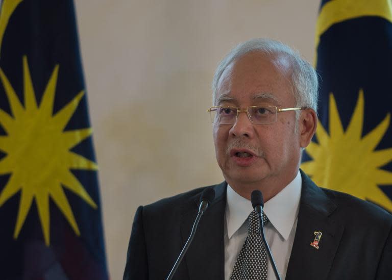 Malaysian Prime Minister Najib Razak, pictured here in Putrajaya, outside Kuala Lumpur on February 6, 2015, launched 1MDB in 2009 and still chairs its advisory board