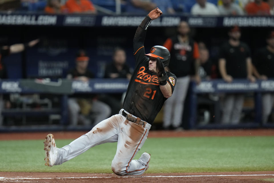 Baltimore Orioles' Austin Hays scores on a sacrifice fly by Ramon Urias off Tampa Bay Rays starting pitcher Corey Kluber during the sixth inning of a baseball game Friday, Aug. 12, 2022, in St. Petersburg, Fla. (AP Photo/Chris O'Meara)