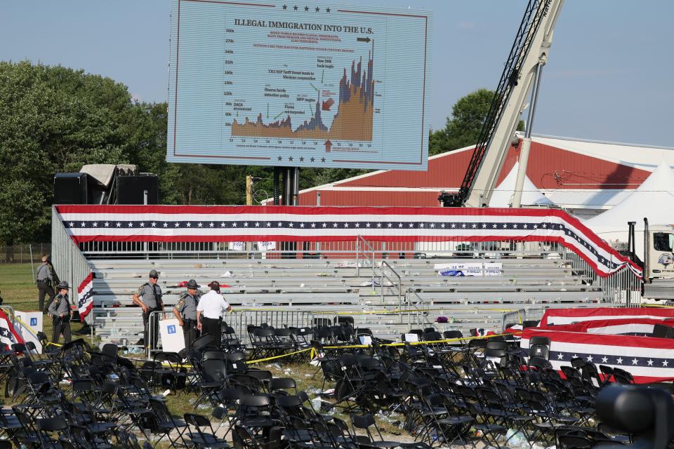 Security personnel inspect the site after gunfire rang out during a campaign rally at the Butler Farm Show in Butler, Pennsylvania, on July 13, 2024.
