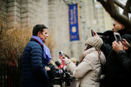 Chilean victim of clerical sexual abuse Juan Cruz speaks with media after meeting with investigator, Archbishop Charles Scicluna of Malta in New York City, New York, U.S., February 17, 2018. REUTERS/Eduardo Munoz