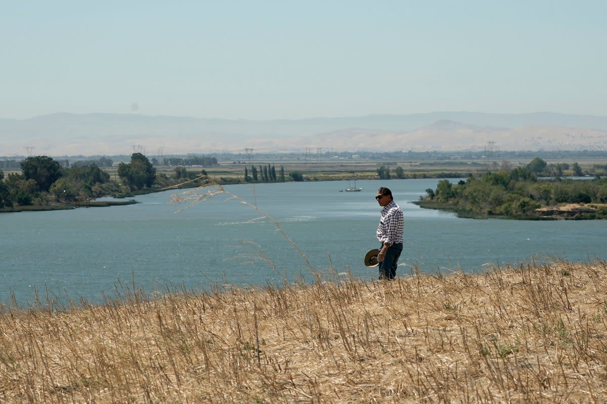 Freshwater Losing Battle Against Ocean (Copyright 2022 The Associated Press. All rights reserved)