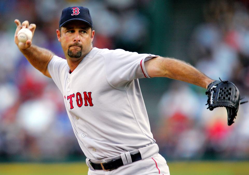 ARLINGTON, TX - JULY 5: Starting pitcher Tim Wakefield #49 of the Boston Red Sox throws against the Texas Rangers on July 5, 2005 at Ameriquest Field in Arlington in Arlington, Texas.  (Photo by Ronald Martinez/Getty Images) 