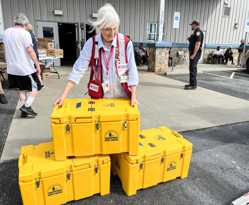 Dee Besecker, Greenville/Mountain Area Chapter of Red Cross helps bring in hot meals to the Ag Center Shelter near the Asheville Regional Airport Sept. 29, 2024.