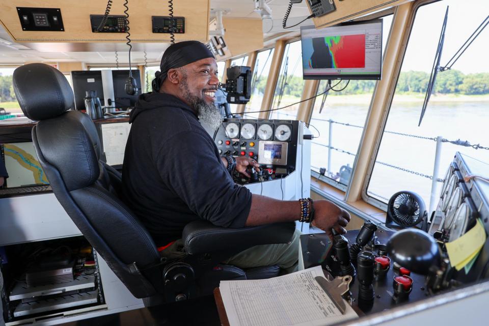 James Garner, 47, monitors dredging during a shift on the Dredge Potter, a U.S. Army Corps of Engineers vessel working to maintain a 9-foot-deep channel in the Mississippi River.