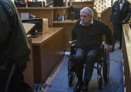 Robert Koehler, who authorities call the "Pillowcase Rapist," enters the courtroom in a wheelchair during his trial, Wednesday, Jan. 25, 2023, in Miami. (Jose A. Iglesias/Miami Herald via AP, Pool)