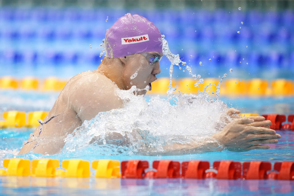 Qin Haiyang of China competes during the men's 200m breastroke final at the World Swimming Championships in Fukuoka, Japan, Friday, July 28, 2023. (AP Photo/Eugene Hoshiko)