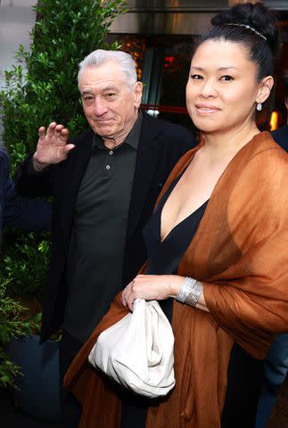 <p>Dimitrios Kambouris/WireImage</p> Robert De Niro (left) and Tiffany Chen on June 10