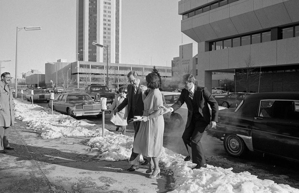 More than six inches of new snow and wind chill readings 30 degrees below zero greeted people who attended Gov. James Thompson's inauguration Jan. 10, 1977. Thompson and his wife Jayne step form the governor's limousine to enter First Presbyterian Church for a prayer breakfast. [File/The State Journal-Register]