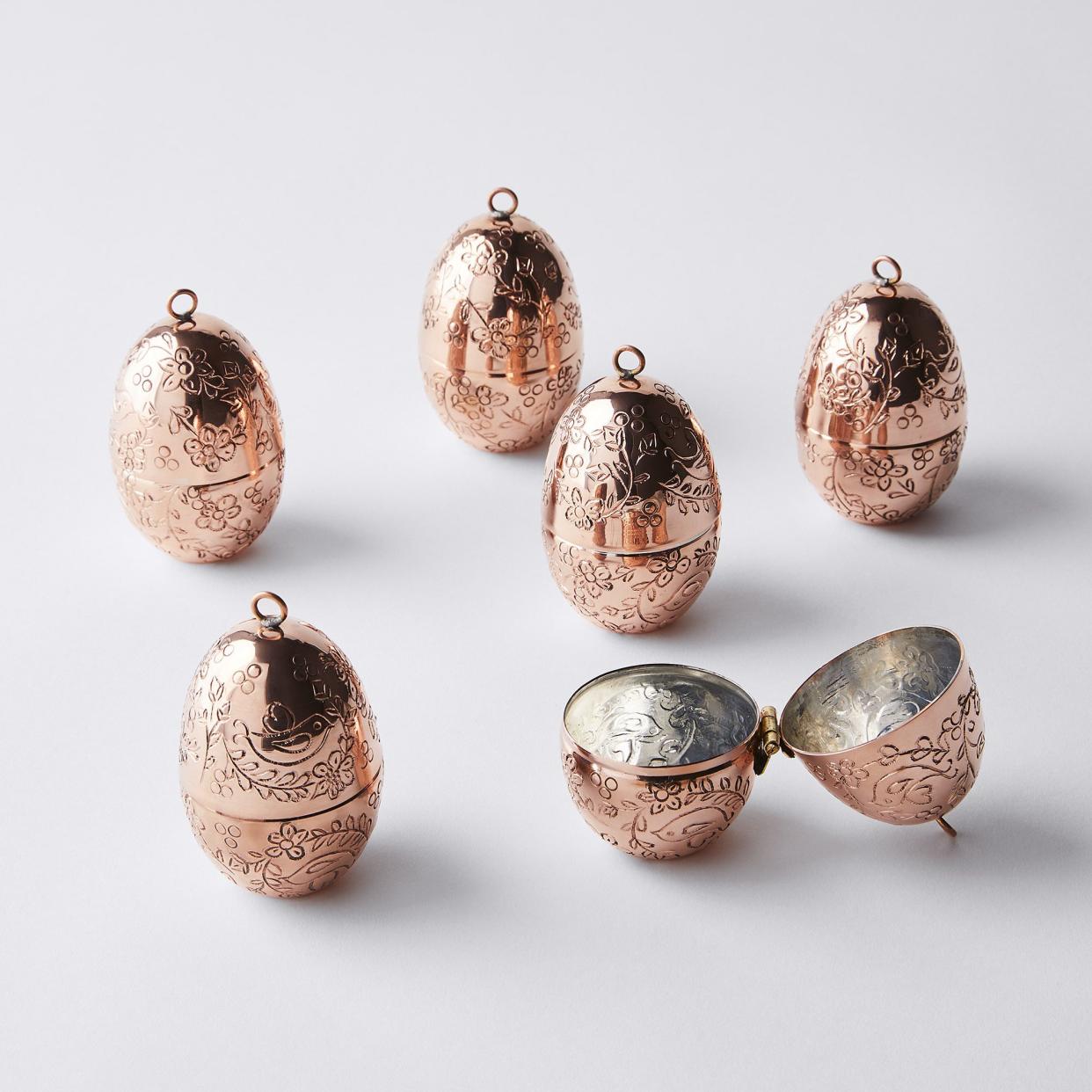 <p><a href="https://go.redirectingat.com?id=74968X1596630&url=https%3A%2F%2Ffood52.com%2Fshop%2Fproducts%2F5739-vintage-inspired-copper-egg-ornaments-set-of-5&sref=https%3A%2F%2Fwww.veranda.com%2Fhome-decorators%2Fg29765710%2Funique-tree-ornaments%2F" rel="nofollow noopener" target="_blank" data-ylk="slk:Shop Now;elm:context_link;itc:0;sec:content-canvas" class="link rapid-noclick-resp">Shop Now</a></p><p>Vintage-Inspired Copper Egg Ornaments </p><p>food52.com</p><p>$150.00</p><span class="copyright">Food 52</span>