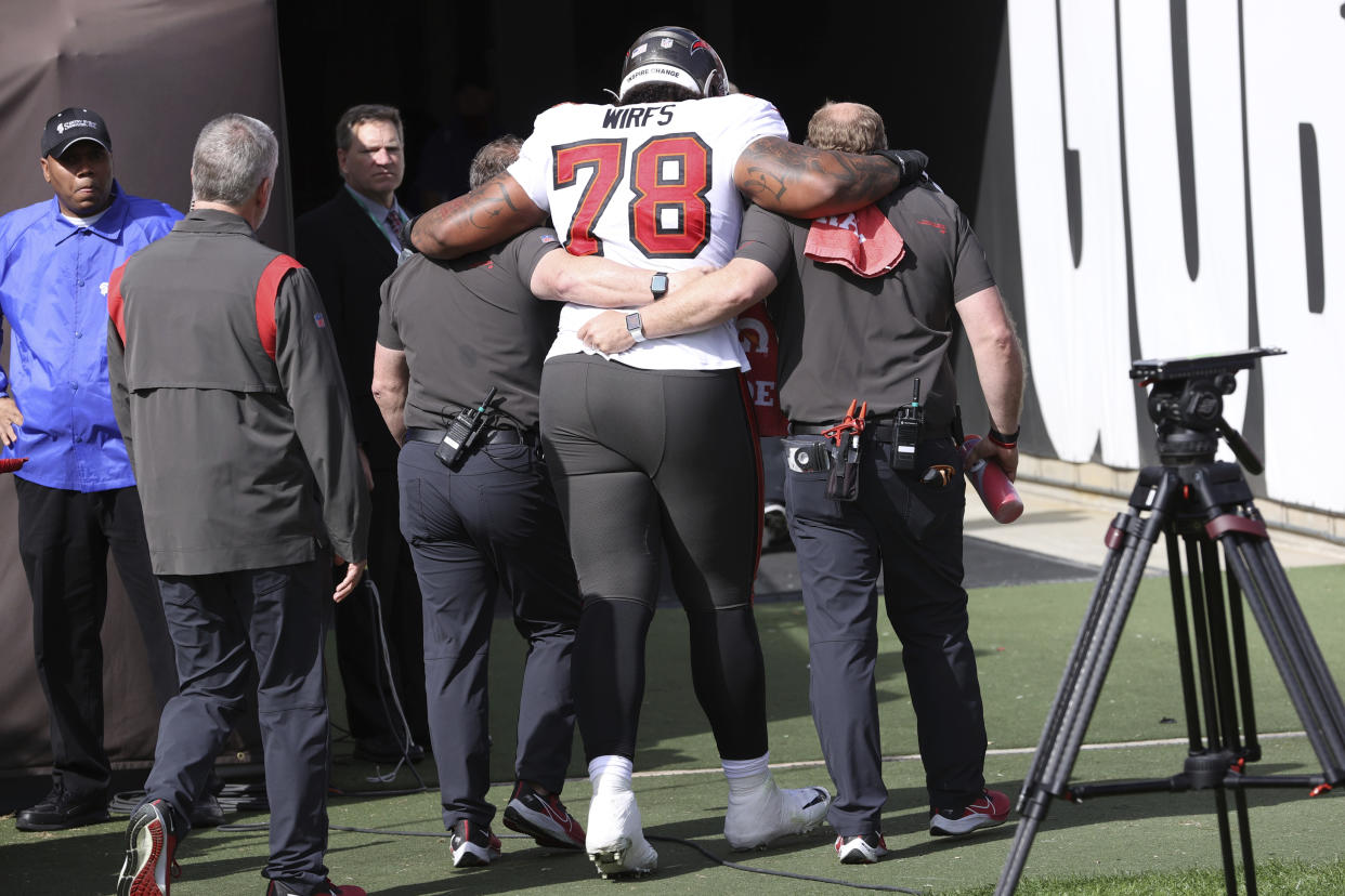 Tristan Wirfs was injured in the first quarter of the Bucs' playoff game against the Eagles. (AP Photo/Mark LoMoglio)