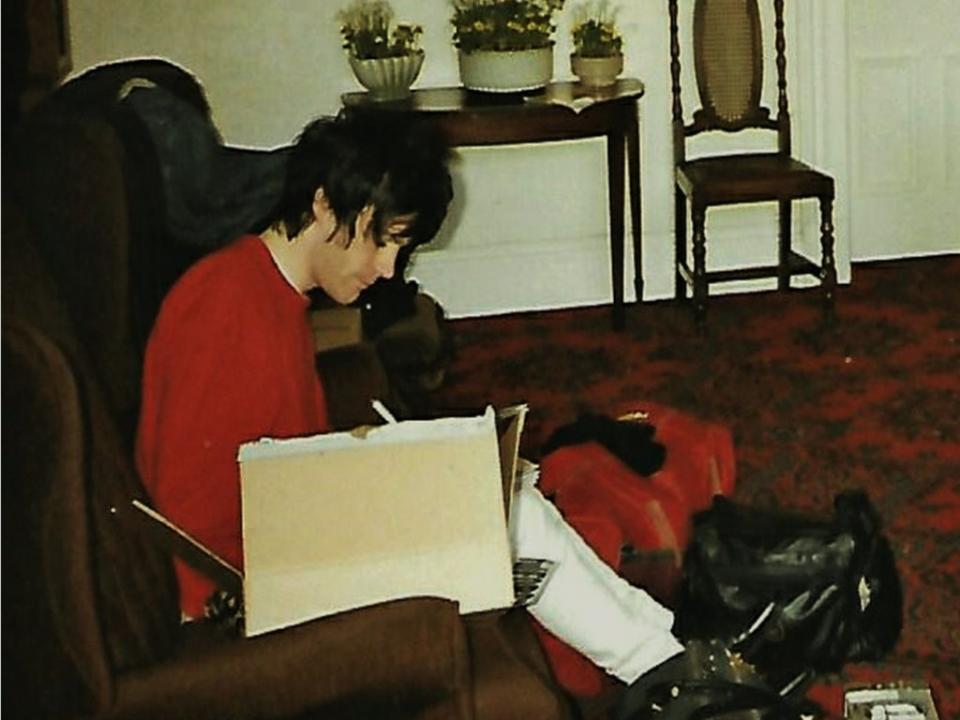 Richey Edwards signing a copy of ‘Generation Terrorists’ (Caffy St Luce)