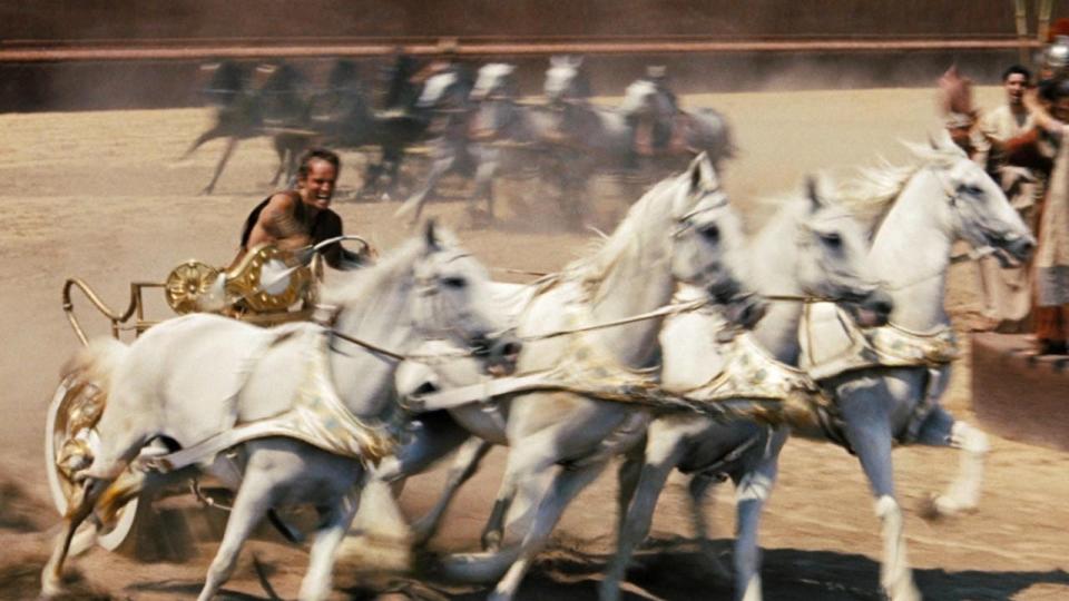 The Oscar-winning 1959 epic "Ben-Hur" performed its famed chariot race the old-fashioned way, with real horses and real riders, such as Charlton Heston, pictured here in the film's title role.