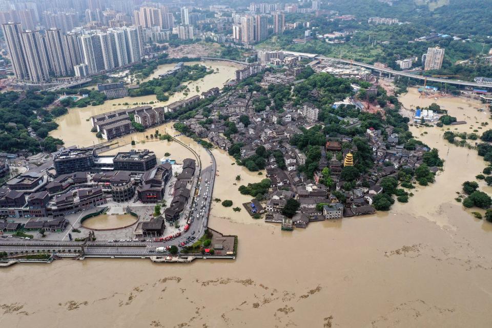 An aerial photo taken on August 19, 2020 shows flooding in China's southwestern Chongqing city. / Credit: STR/AFP/Getty