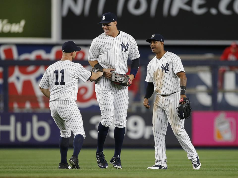 Aaron Judge's dive into the stands to catch a foul ball would make Derek Jeter proud. (AP Photo/Rich Schultz)