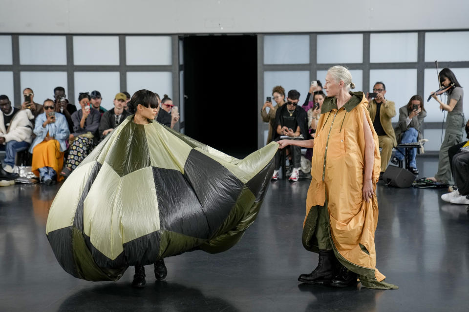 Models wear creations for the Beautiful People ready-to-wear Spring/Summer 2023 fashion collection presented Sunday, Oct. 2, 2022 in Paris. (AP Photo/Francois Mori)