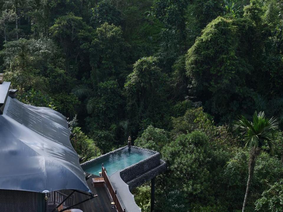 <p>Can we take a moment for this spectacular pool, situated on stilts in the middle of the jungle? The breathtaking pool comes attached to a uniquely-decorated luxury tent, complete with outdoor shower and more.</p><p>Book via: <a href="https://www.capellahotels.com/en/capella-ubud" rel="nofollow noopener" target="_blank" data-ylk="slk:Capella;elm:context_link;itc:0;sec:content-canvas" class="link ">Capella</a></p>