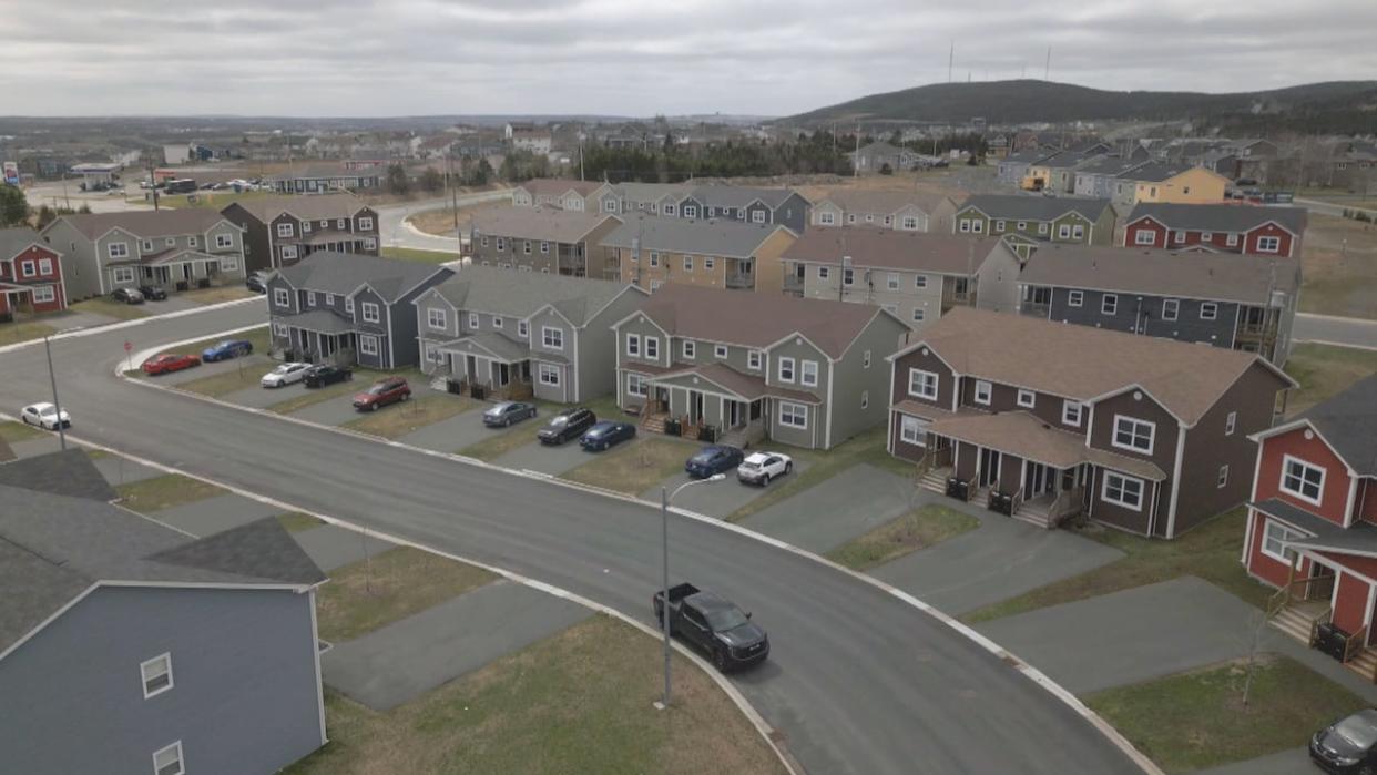 More dense housing, like these fourplexes, could soon be built in more places in St. John's. (Katie Breen/CBC - image credit)