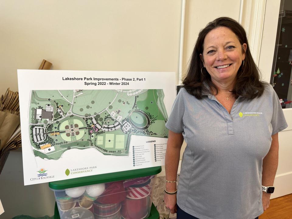 Lakeshore Park Conservancy executive director Julieanne Foy stands next to a drawing of some of the new amenities being constructed at Lakeshore Park. The work on this phase is scheduled to be completed next year.