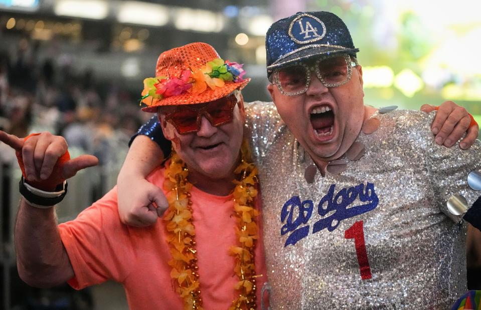 Dave Hawkins (left) and Ben Bullock smiles for a photo during Elton John Farewell Yellow Brick Road Tour on Friday, April 1, 2022, at Gainbridge on Gainbridge Fieldhouse in Indianapolis. 