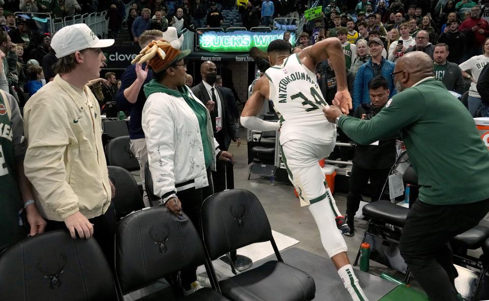 Bucks forward Giannis Antetokounmpo runs down the tunnel towards the Pacers' locker room after the game Wednesday.