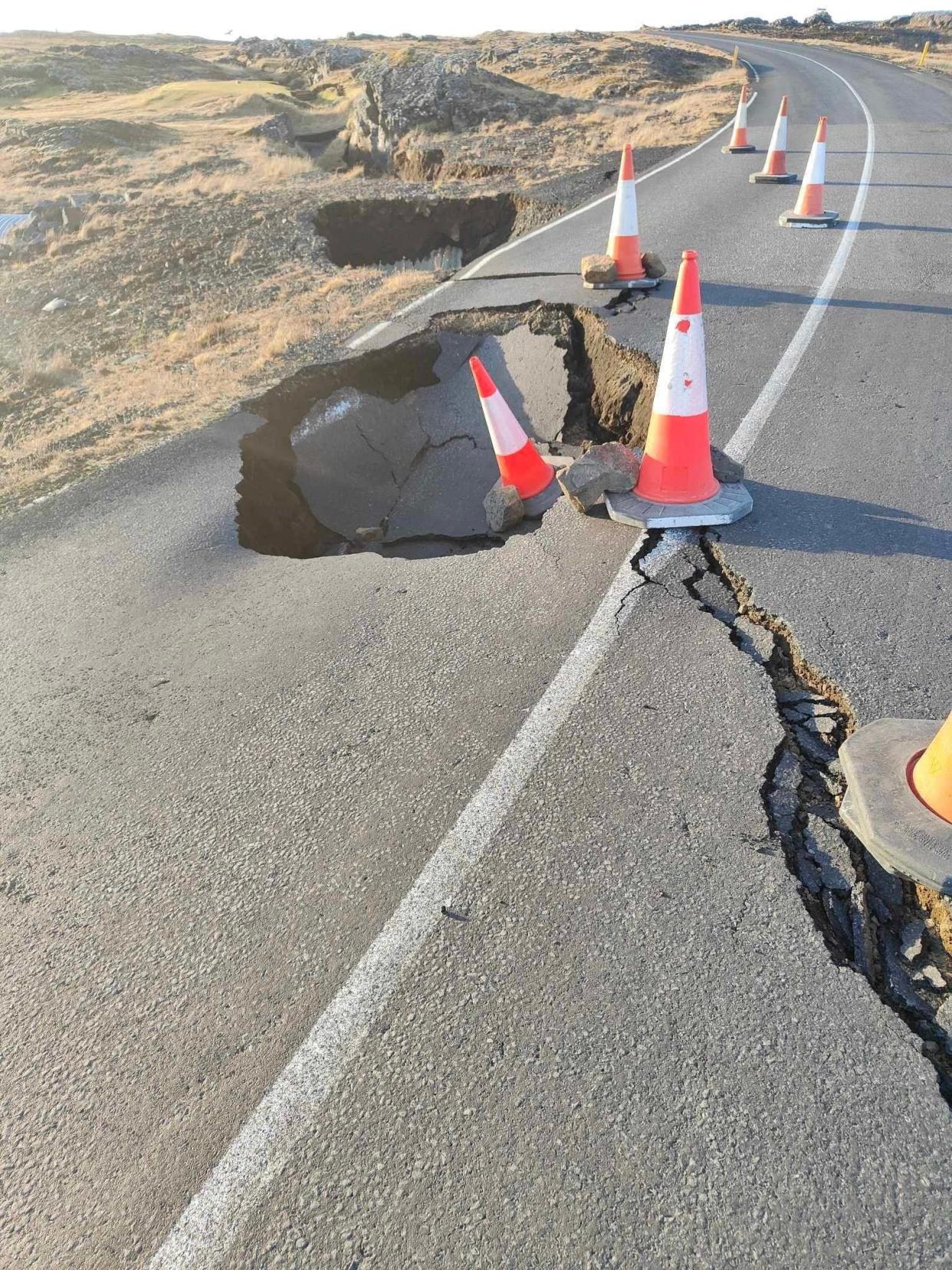 A view of cracks, emerged on a road due to volcanic activity, near Grindavik (Reuters)