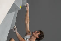 Nathaniel Coleman, of the United States, competes during the bouldering portion of the men's sport climbing final at the 2020 Summer Olympics, Thursday, Aug. 5, 2021, in Tokyo, Japan. (AP Photo/Gregory Bull)