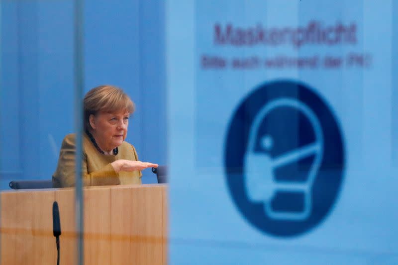 German Chancellor Angela Merkel holds a news conference in Berlin