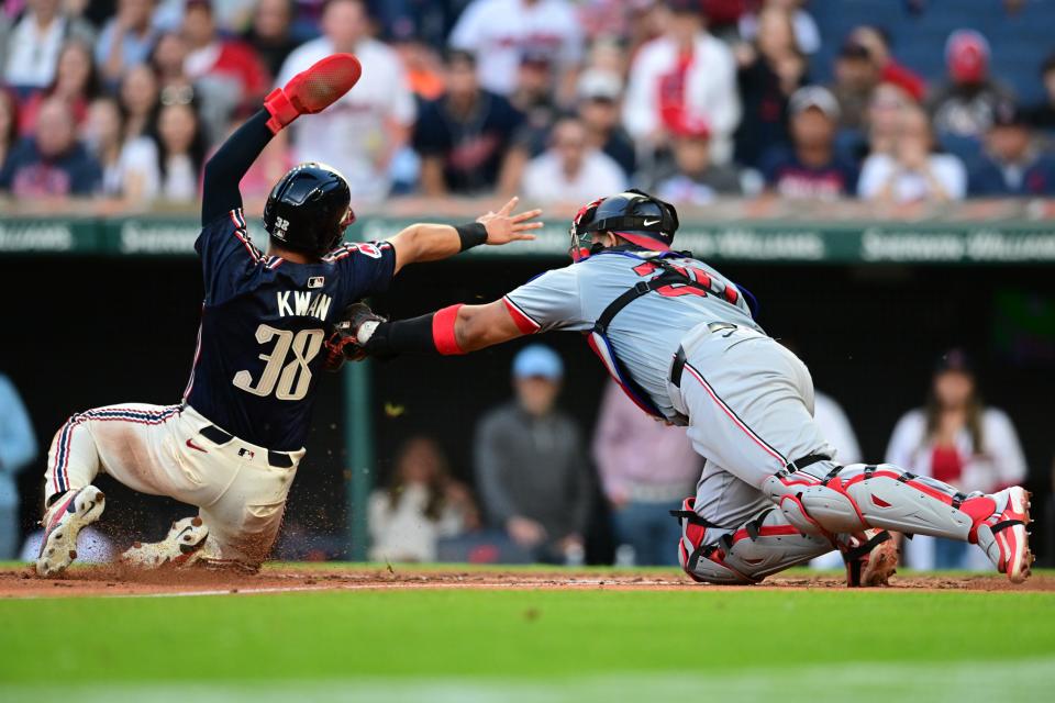 Washington Nationals catcher Keibert Ruiz (20) tags out Cleveland Guardians' Steven Kwan (38) at the plate on May 31 in Cleveland.