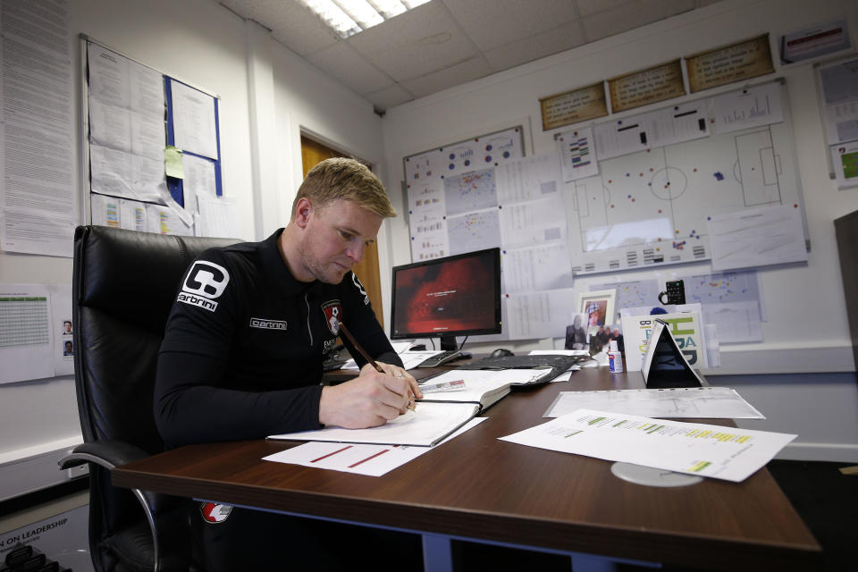 Eddie Howe in the office, possibly listing the pros and cons of putting Steve Fletcher back in the squad