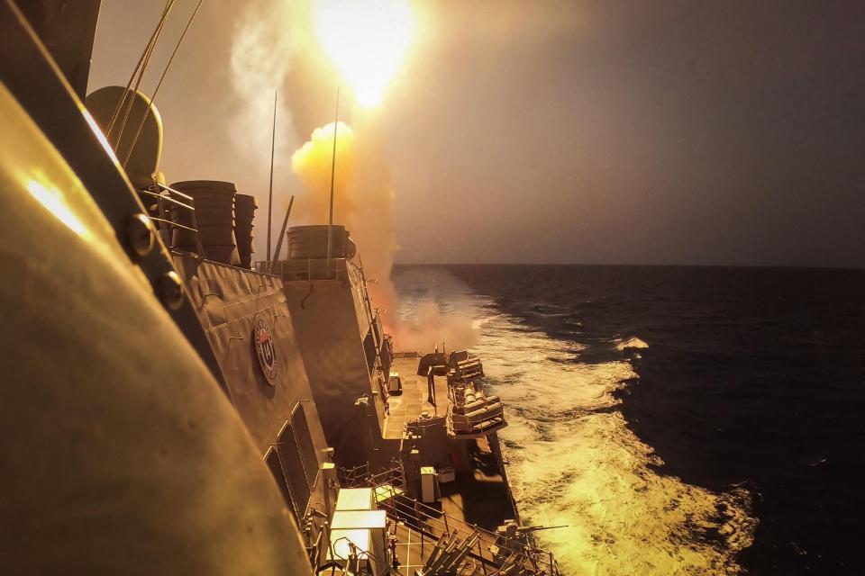 This handout picture courtesy of the U.S. Navy taken on Oct. 19, 2023 shows the Arleigh Burke-class guided-missile destroyer USS Carney defeating a combination of Houthi missiles and unmanned aerial vehicles in the Red Sea