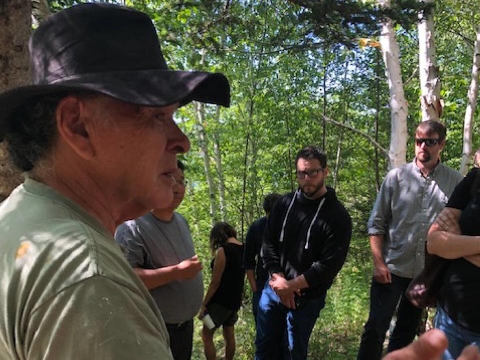 Eskasoni Elder Ernest Johnson teaches about the trees of Unama'ki, or Cape Breton. (Submitted by Annie Johnson - image credit)