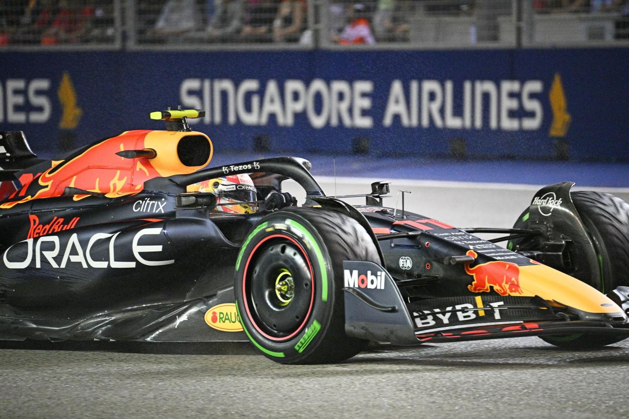 Red Bull's Mexican driver Sergio Perez drives during the Formula One Singapore Grand Prix Night Race at the Marina Bay Street Circuit in Singapore on Oct. 2, 2022. (Photo by Then Chih Wey/Xinhua via Getty Images)
