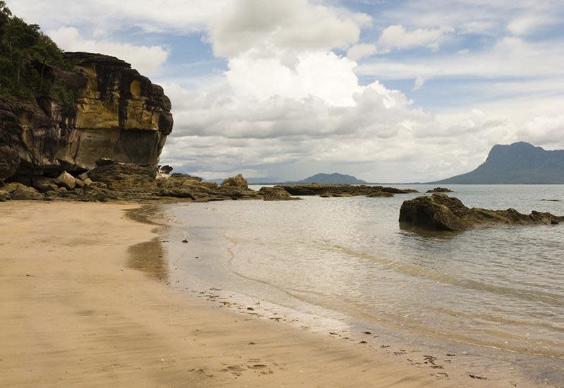 There are some fantastic beaches on the north west coast of Borneo, around the capital of Kuching and beyond. One of the best places is Pandanus Bay (Telok Pandan) in the Bako National Park, with its weathered sea stacks, teeming jungle foreshore and panoramic outlook. Here within the Bako National Park, it’s not unusual to hear a calls of Proboscis monkeys rustling in the trees that line the beach. During monsoon season from November to March, heavy rains create impressive streams and waterfalls in the park. Best of all, there are fewer tourists at this time.